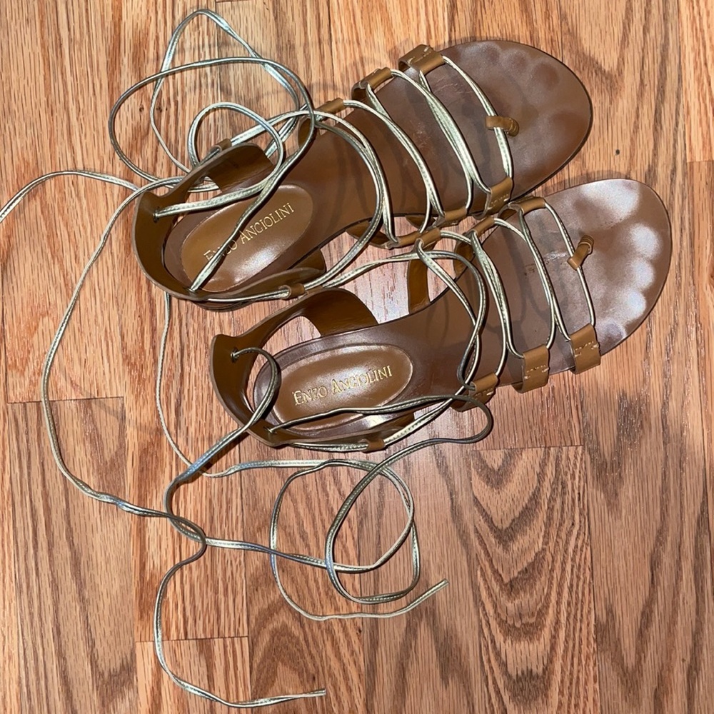Enzo Angiolini leather gladiator sandals with gold leather strap.